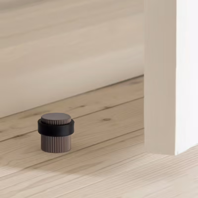 Dörrstopp Helix Stripe - Mörk brons