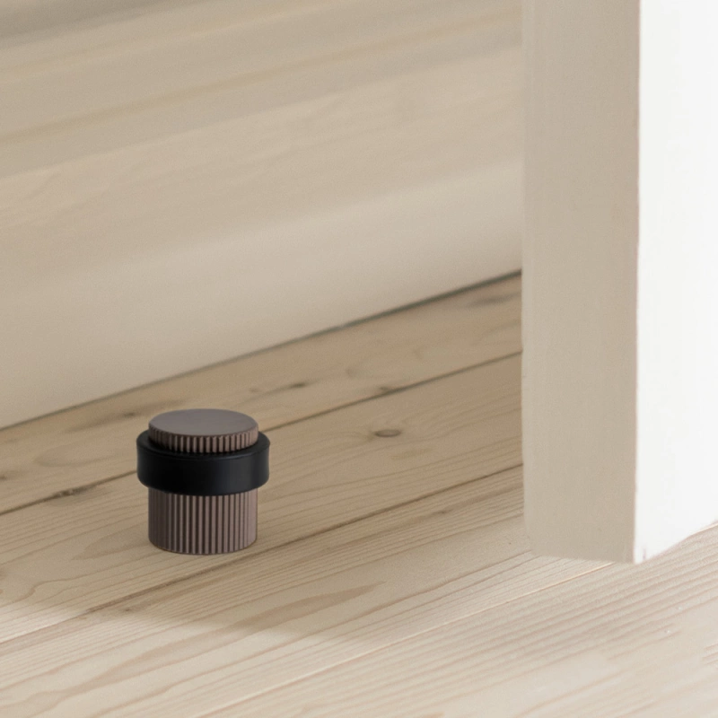 Dörrstopp Helix Stripe - Mörk brons